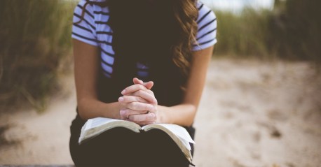 36116-womanpraying-Bible-pexels.1200w.tn