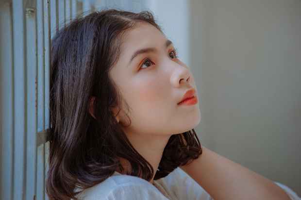 close up photography of a woman